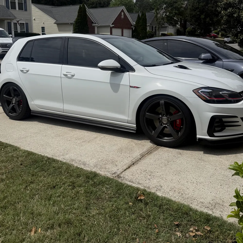 White Volkswagen GTI with dark window tint by Torque N Tint Co. in Simpsonville, SC