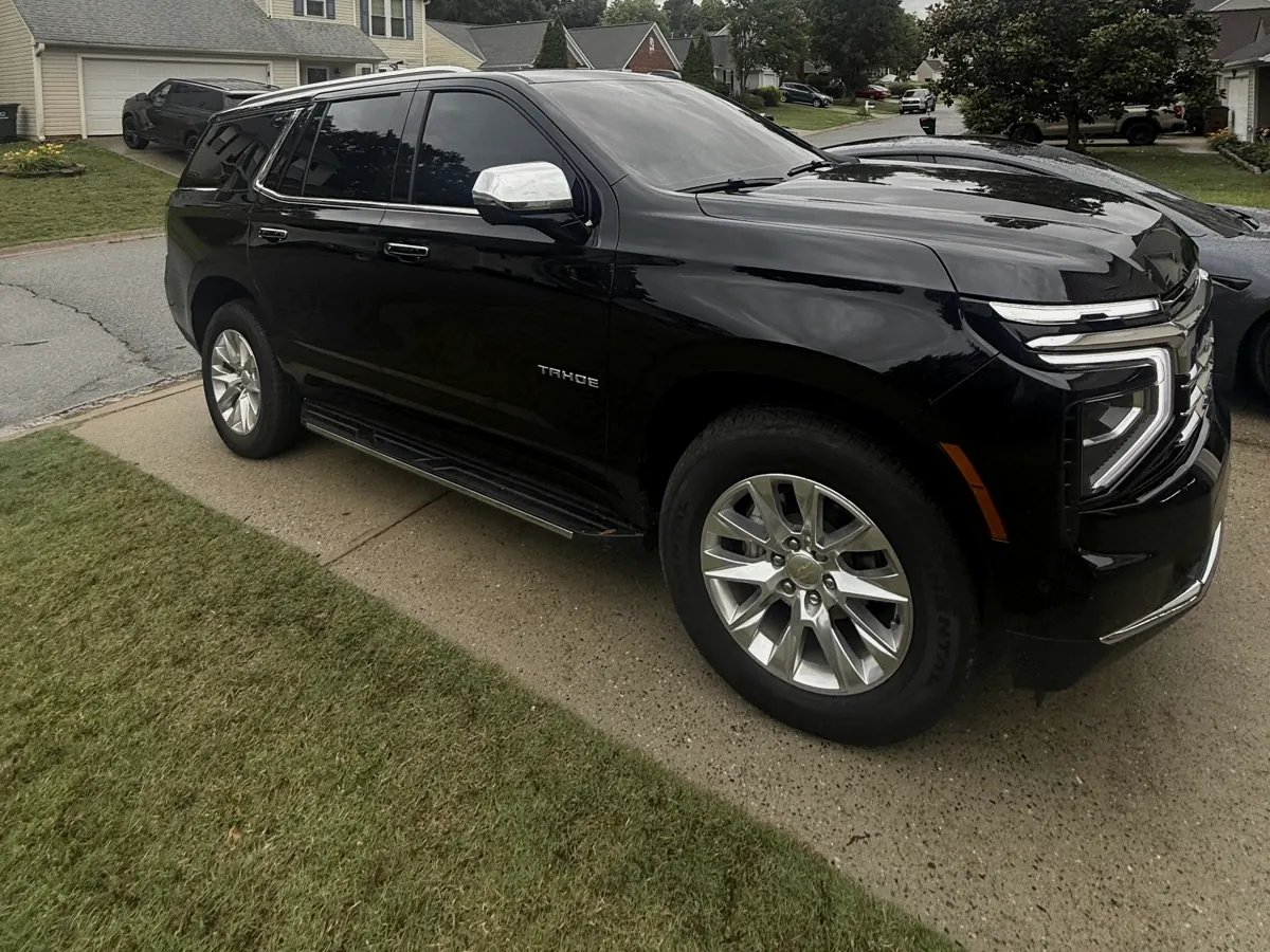Black Chevrolet Tahoe with privacy tint, Greenville SC
