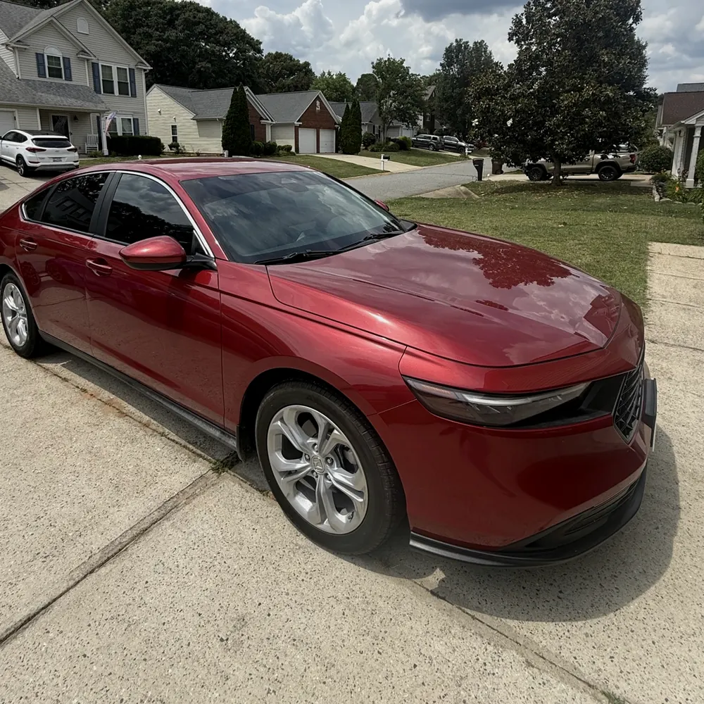 Red Honda Accord with fresh window tint after removal, Simpsonville SC