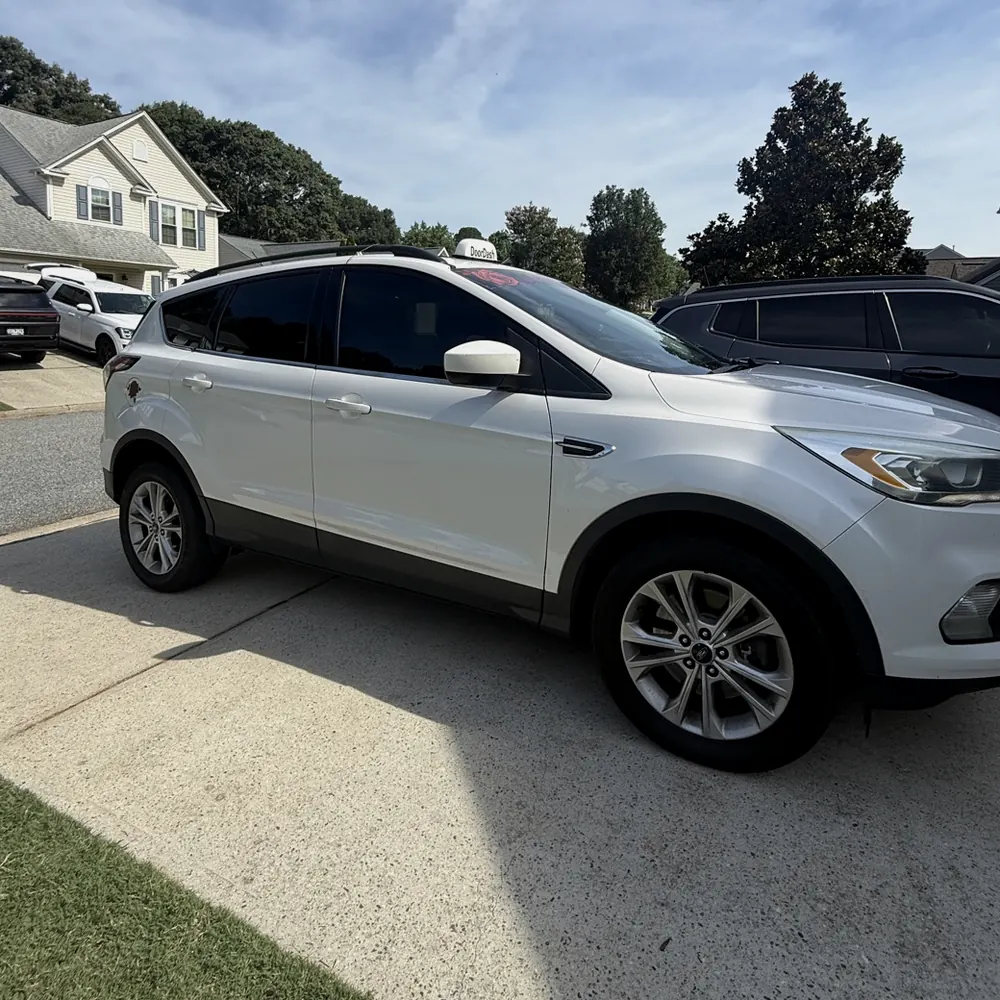 White SUV with tinted windows, installed for a Woodruff customer